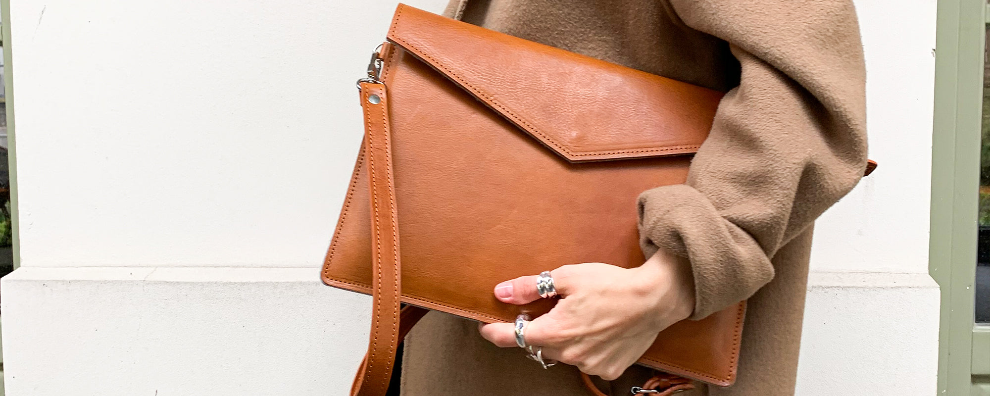 women's city style classic sleeve bag for macbook made from premium italian leather in cognac brown color