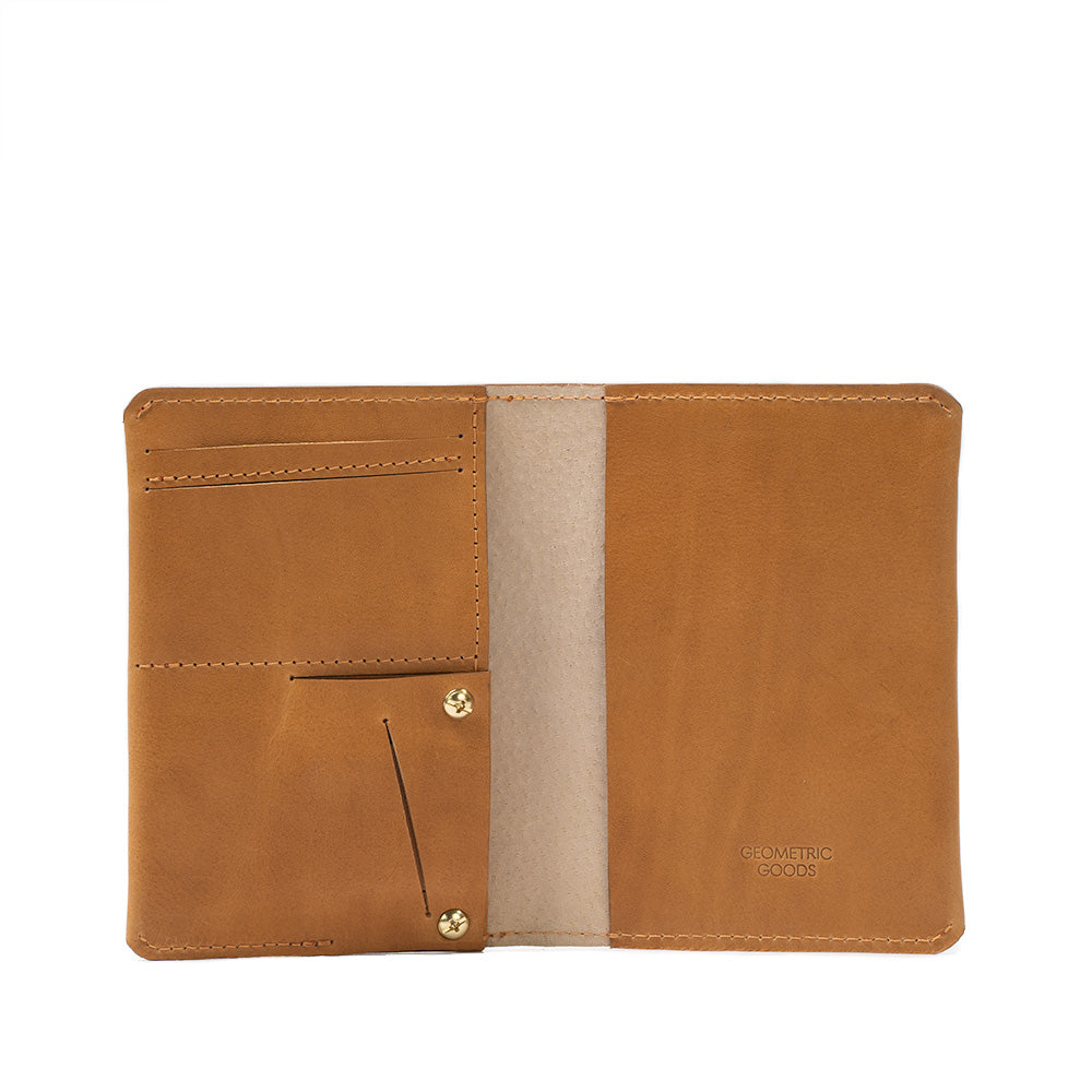 Geometric Goods' smart and trackable AirTag passport holder, crafted from premium camel light brown Italian leather