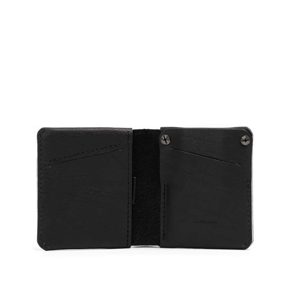 The best men's AirTag billfold wallet with hidden slot, crafted by Geometric Goods from premium full-grain Italian leather in black color.