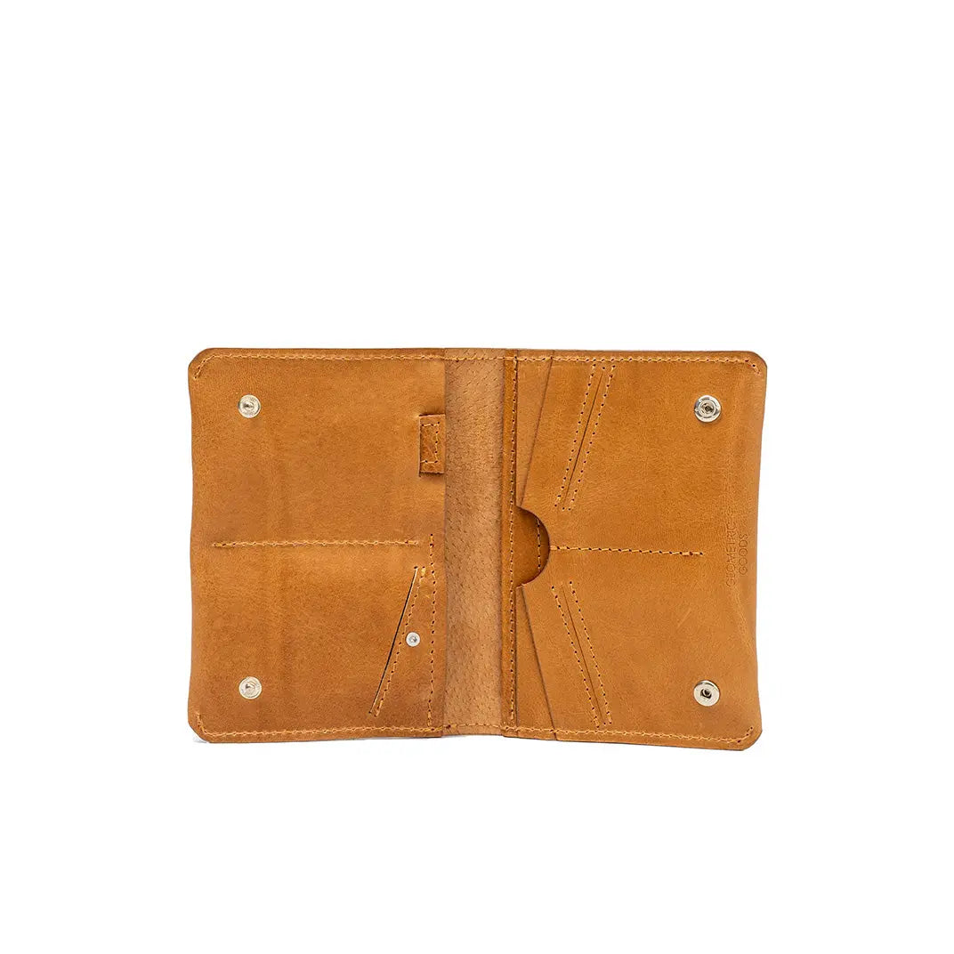 travel wallet for passport compaticle with AirTag made of leather in camel (light brown) color