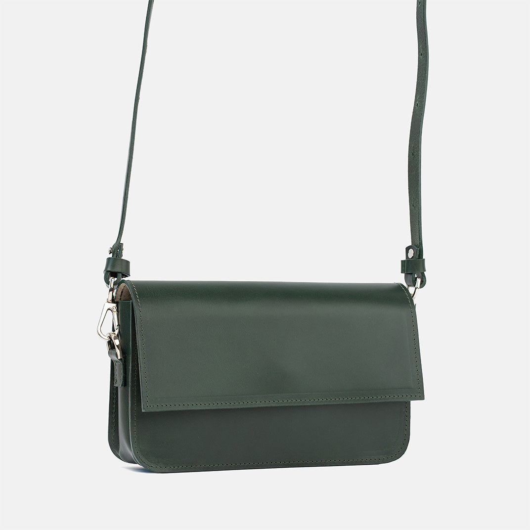 Elegant designer dark green leather shoulder purse with adjustable strap
