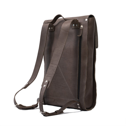grey leather backpack made by Geometric Goods