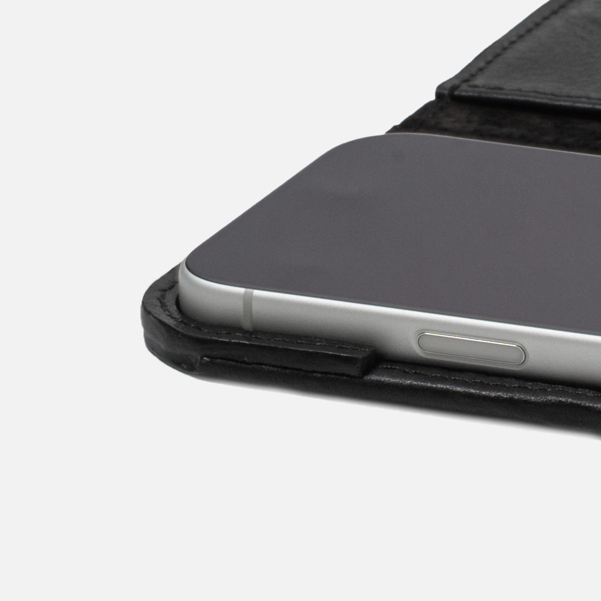 Close-up of iPhone 17 Series in Classic 5.0 leather folio case wallet — protective leather frame, suede lining, MagSafe-ready secure edge grip