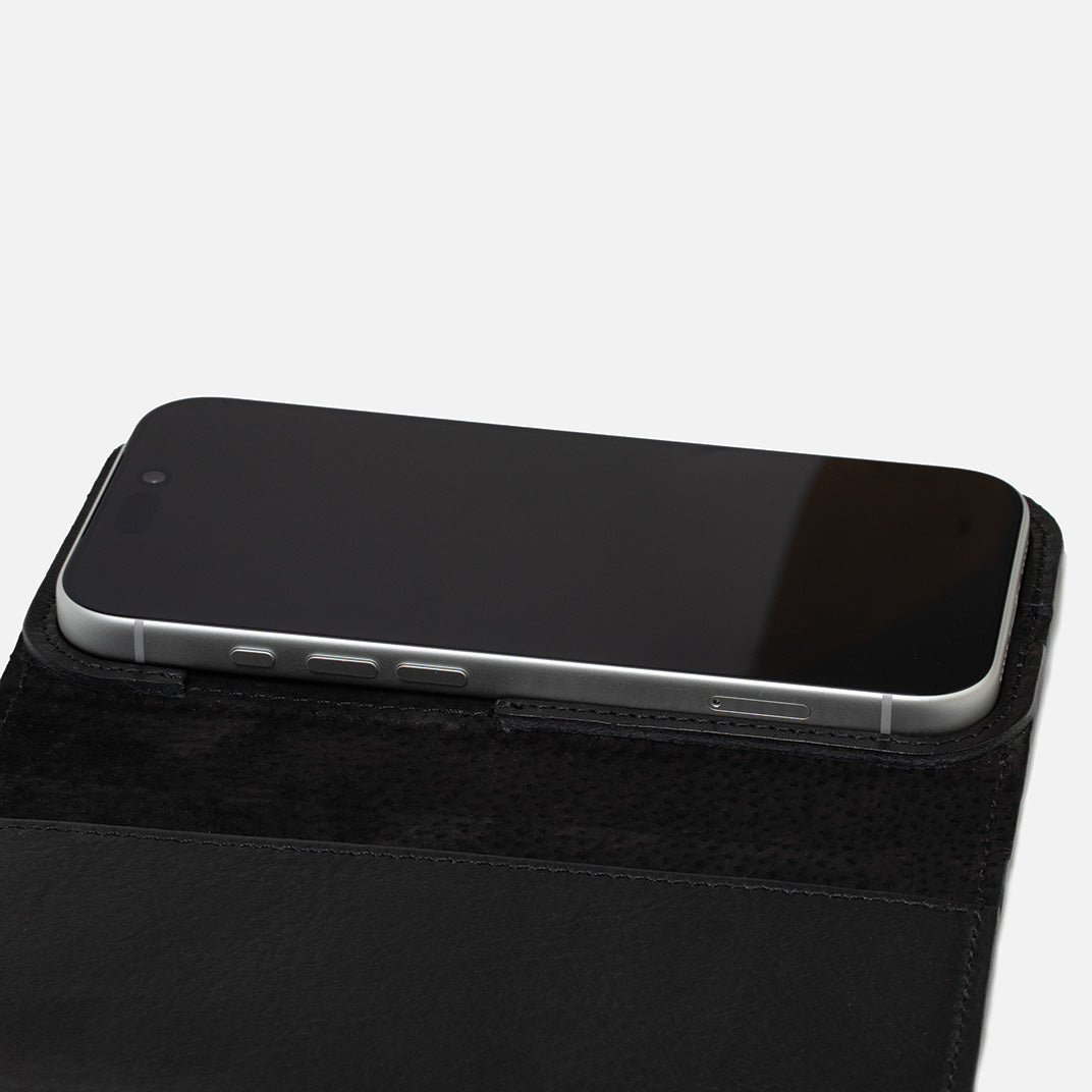 Close-up of iPhone 17 Series in Classic 5.0 leather folio case wallet — suede lining, protective edge channel, MagSafe-ready for smooth snap-on/off