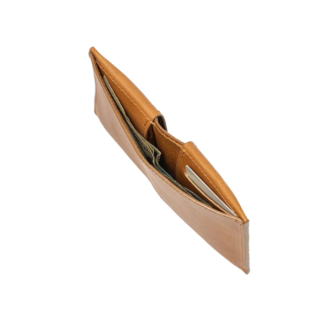 Top view of an open leather AirTag wallet with RFID protection, showing interior slots for cards and bills with a hidden compartment for AirTag