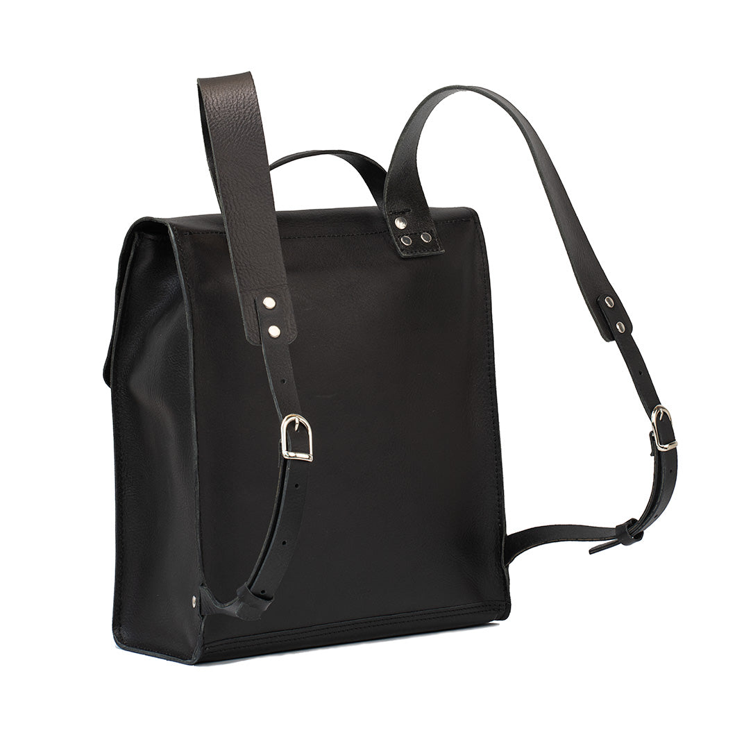 Back view of the Fibonacci leather backpack highlighting adjustable wide straps for comfortable wear