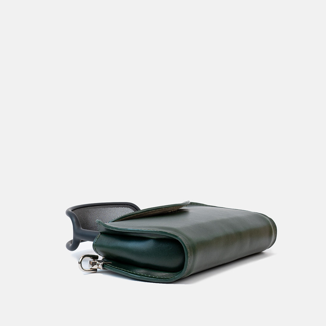 Front view of a leather case for AirPods Max in Forest Green, featuring a compact and structured design with a smooth flap closure