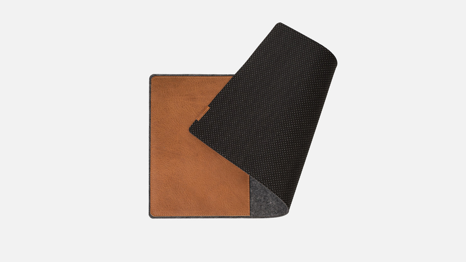 Wool felt desk pad with brown leather mouse insert; corner lifted to show the non-slip base