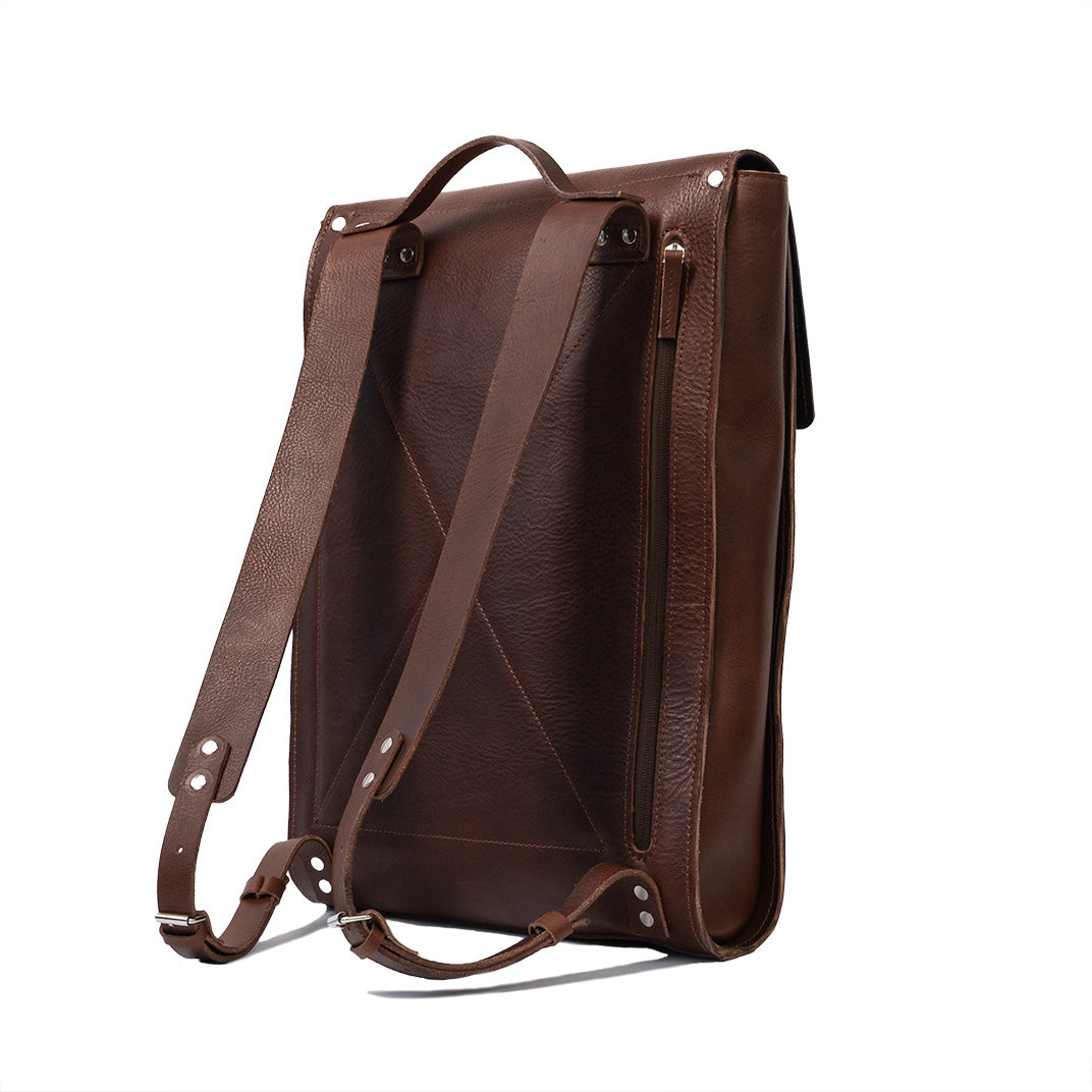 designers leather backpack in rich Mahogany color, compatible with laptop