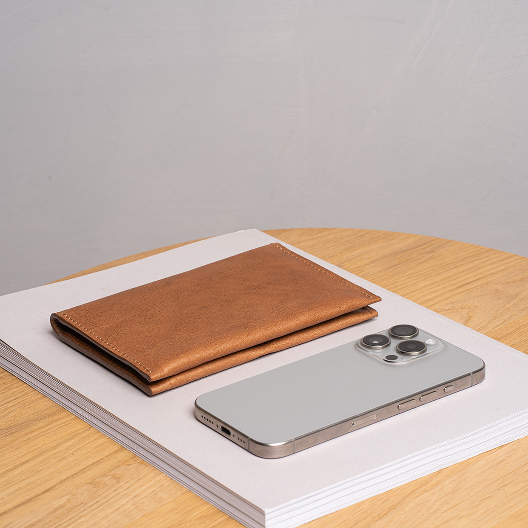 trackable passport holder with dedicated hidden pocket for AirTag