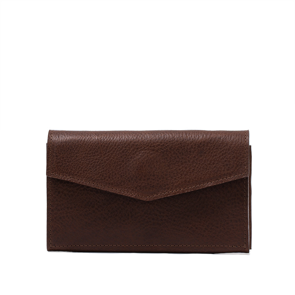 Angled view of a mahogany leather AirTag wallet showing its folded compartments.