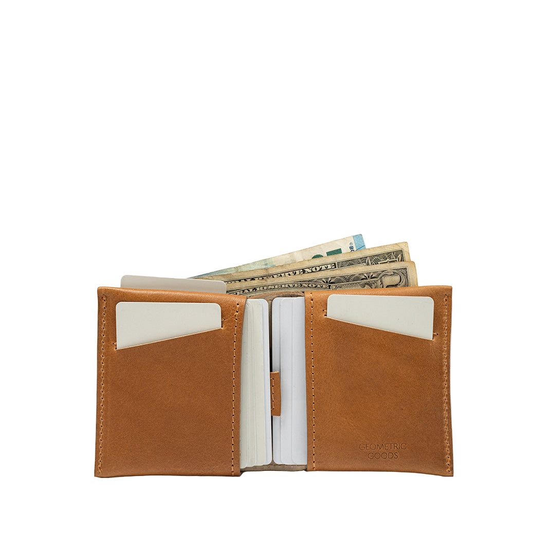 Open tan leather bifold wallet displaying card slots and cash compartments.