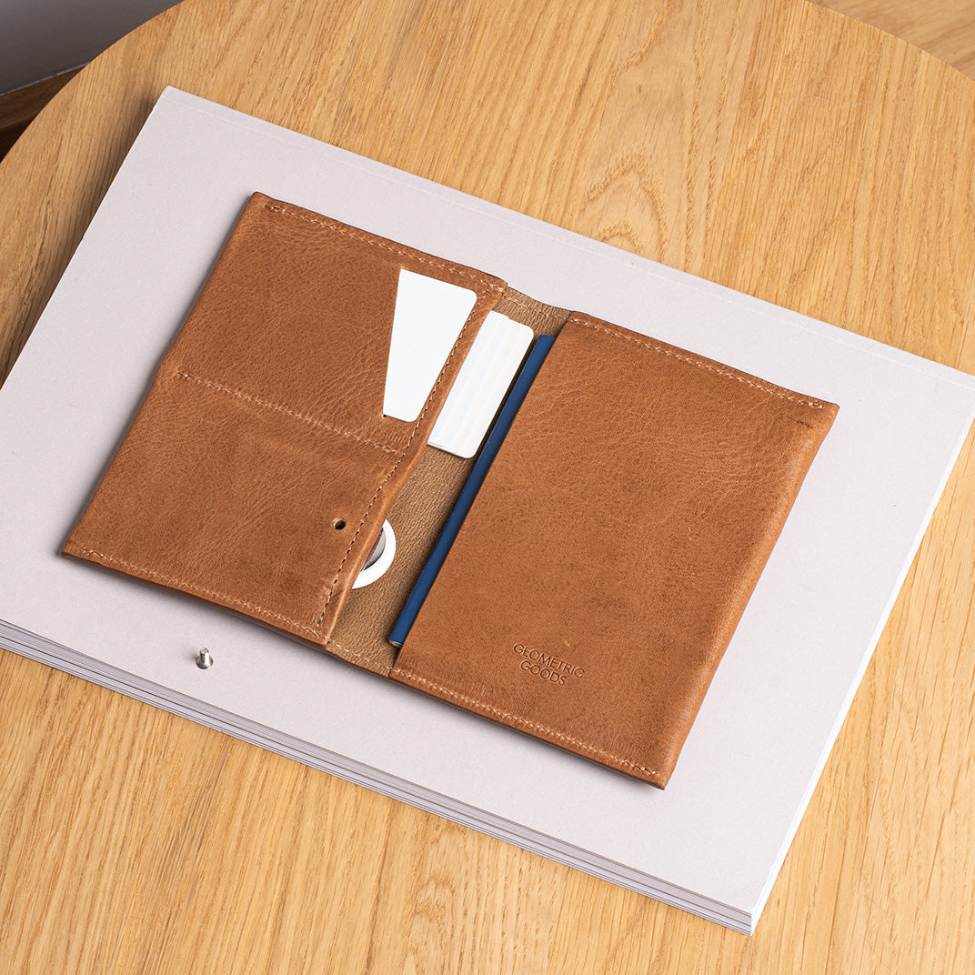 AirTag passport cover with secure compartment for Apple's tracker