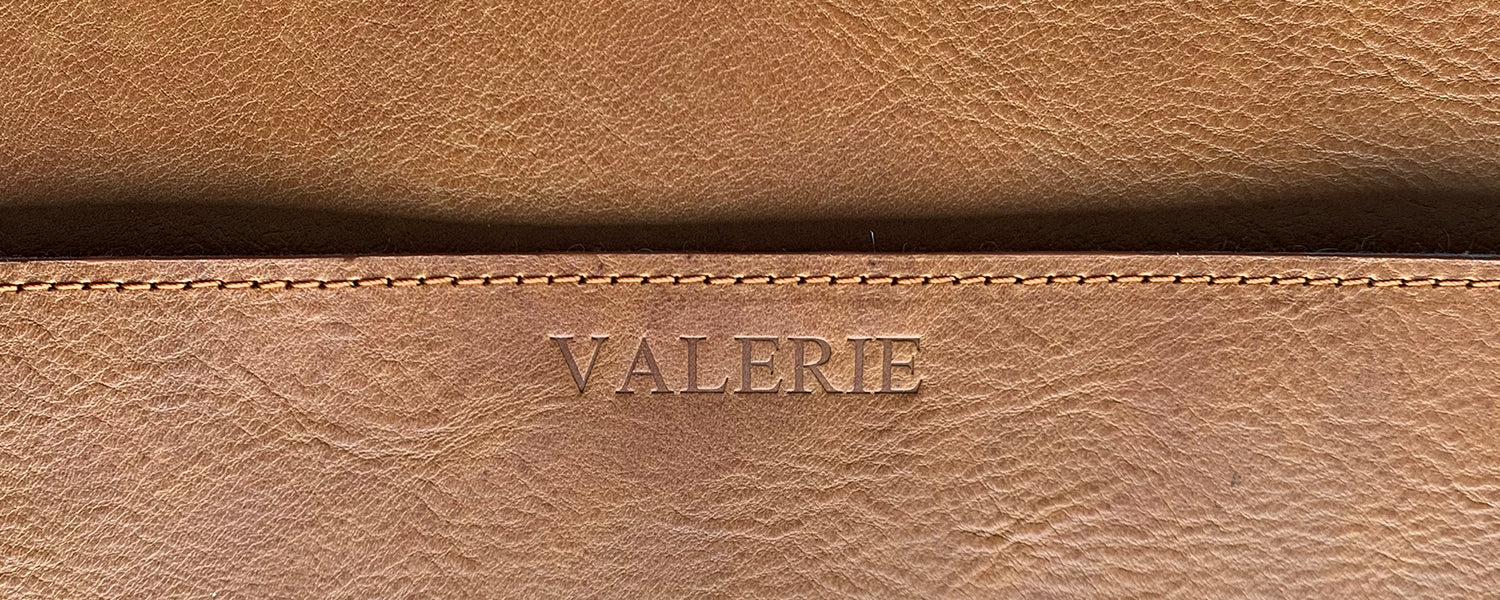 photo of personalization for premium leather sleves and bags for macbook air and pro series 13" 14" 15" 16"