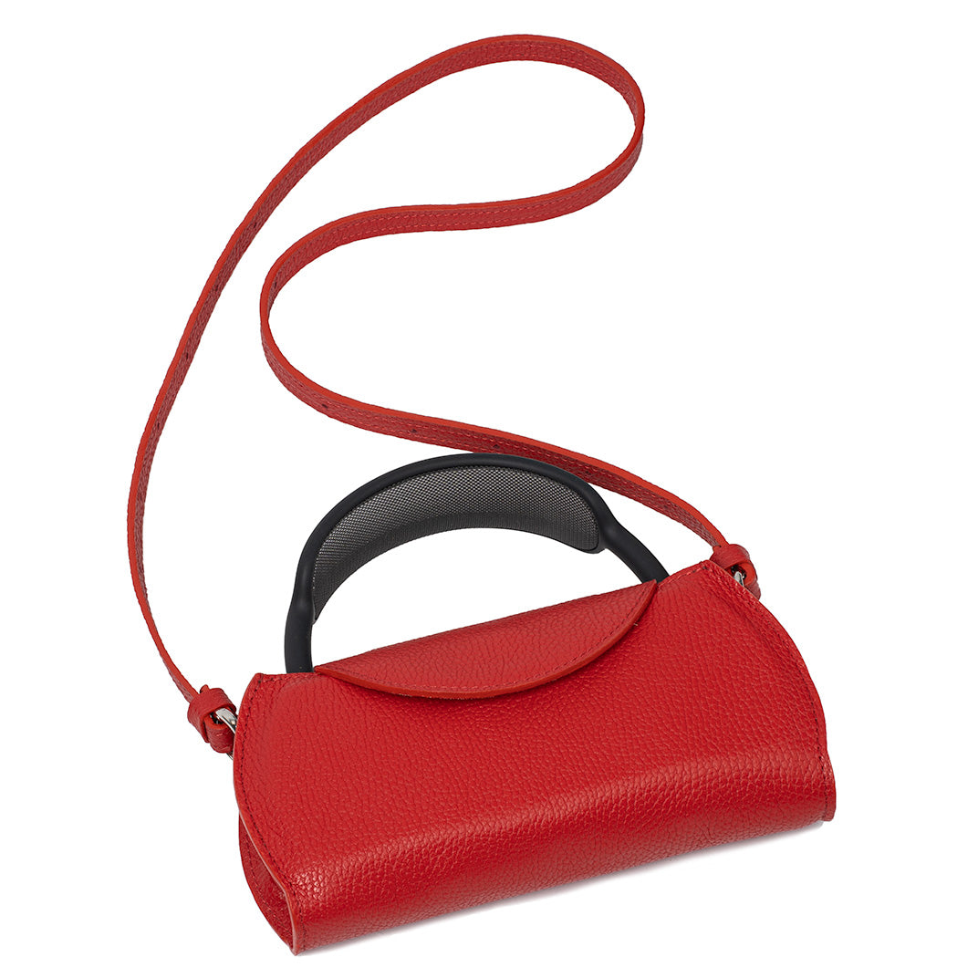 Top view of Gometric Goods’ Ruby Red Leather AirPods Max Shoulder Case with an adjustable strap