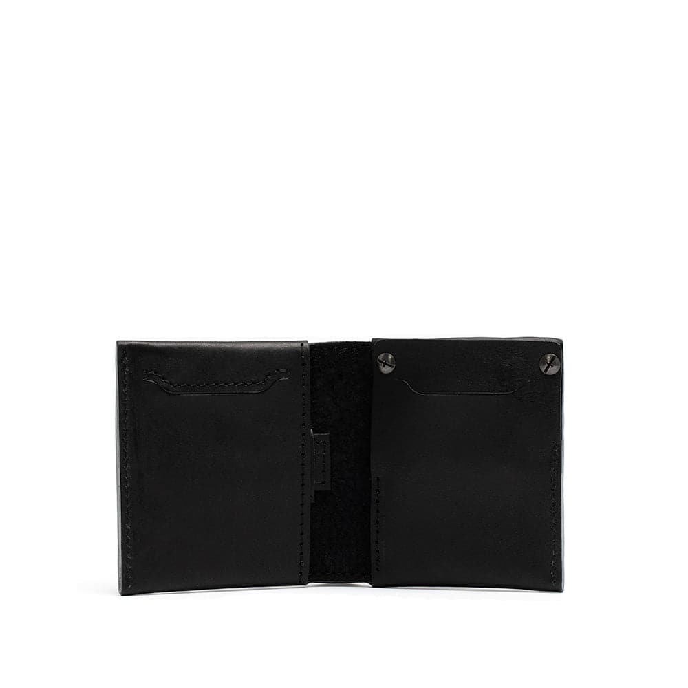 Black leather AirTag billfold wallet 2.0 featuring a sleek and modern design