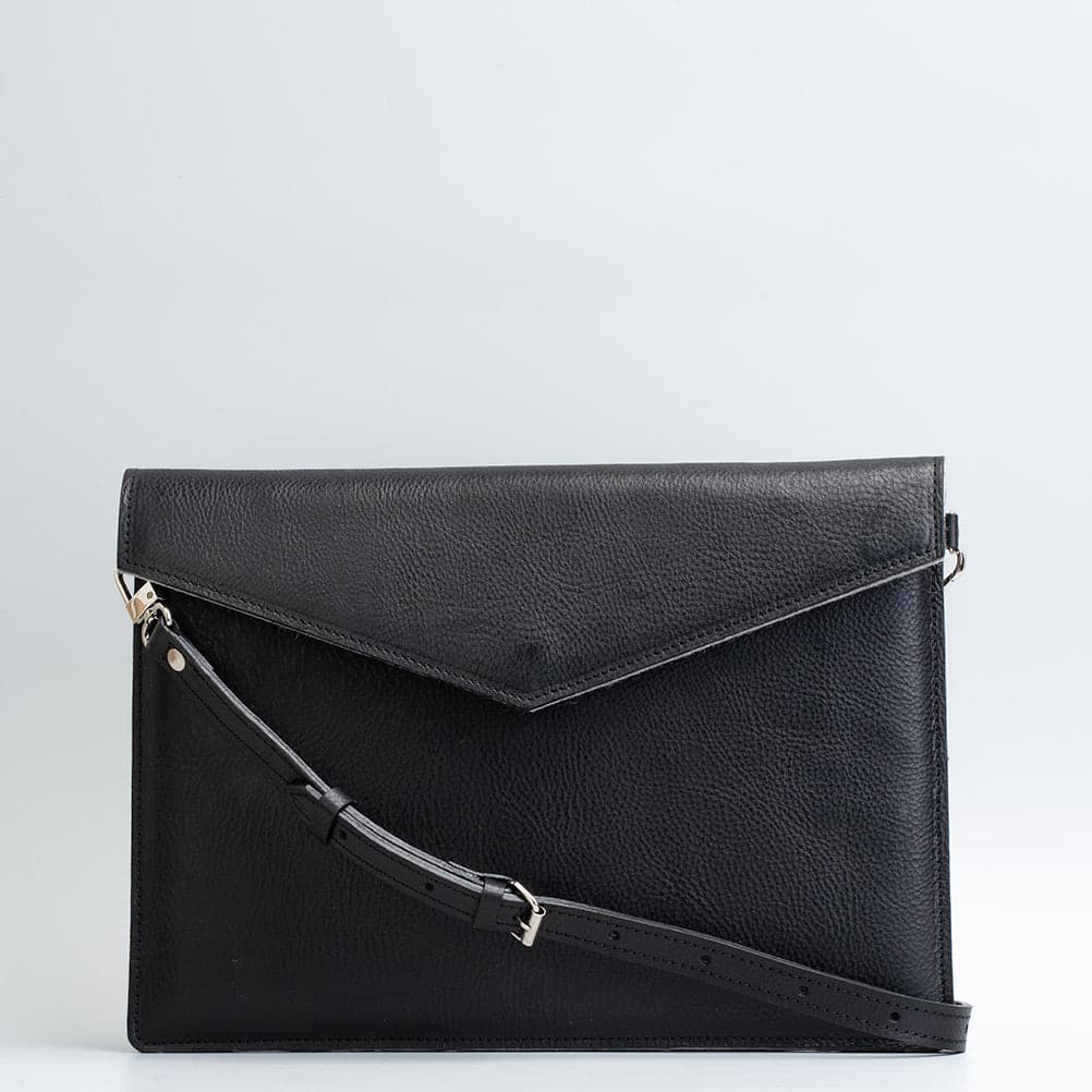classic black color Leather Sleeve with adjustable strap for iPad made by Geometric Goods from premium quality Italian leather for woman and men