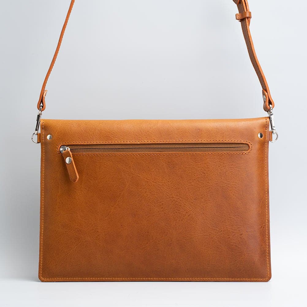 cognac brown color Leather Sleeve with adjustable strap for iPad made by Geometric Goods from premium quality Italian leather for woman and men