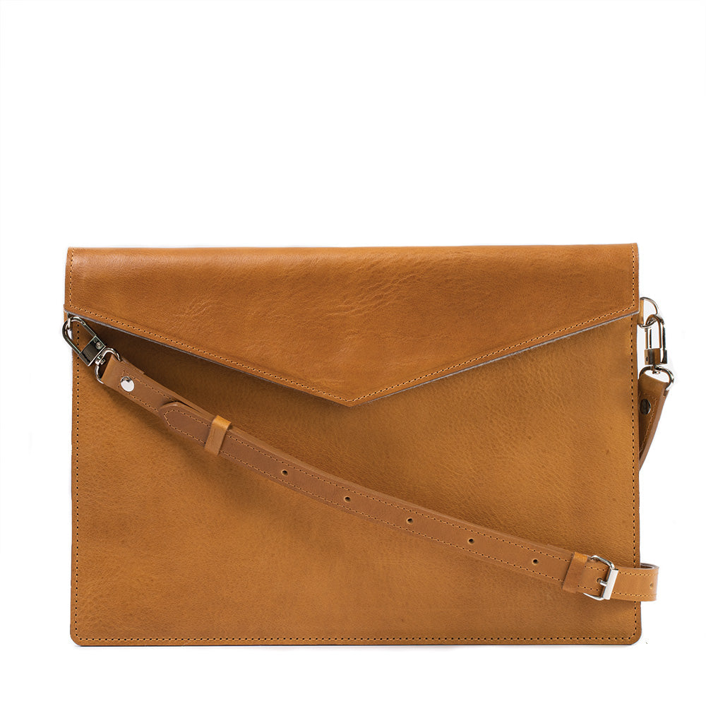 Camel light brown brown color Leather Sleeve with adjustable strap for Macbook Air and MacBook Pro made by Geometric Goods from premium quality Italian leather for lady and men