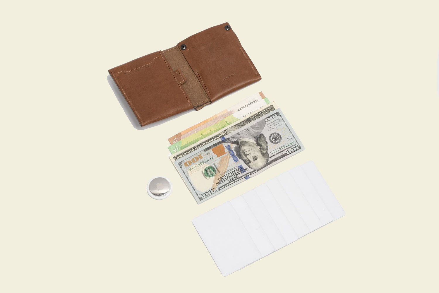 the photo of the best leather AirTag wallet for man and woman which can hold up to 8 cards and banknotes with secret slot for apple's air tag
