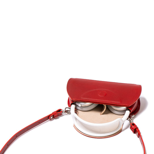 https://geometricgoods.com/cdn/shop/files/AirPods-Max-case-bag-in-red-color-made-from-top-grain-italian-leather-by-geometric-goods.jpg?v=1698921470&width=533
