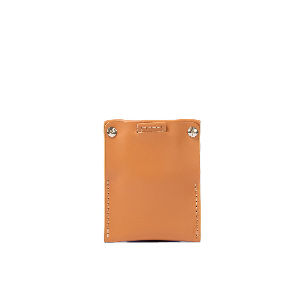 AirTag card wallet holder made from premium top-grain leather in light orange, designed for women.