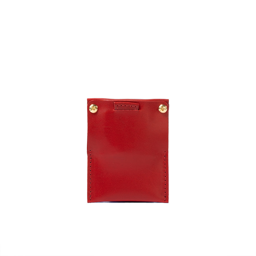 Woman's premium top-grain leather AirTag card wallet holder in red by Geometric Goods