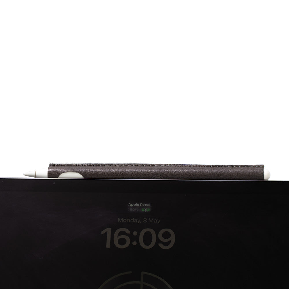 apple pencil 2 carrying case sleeve made by Geometric Goods from grey italian leather is charging on iPad
