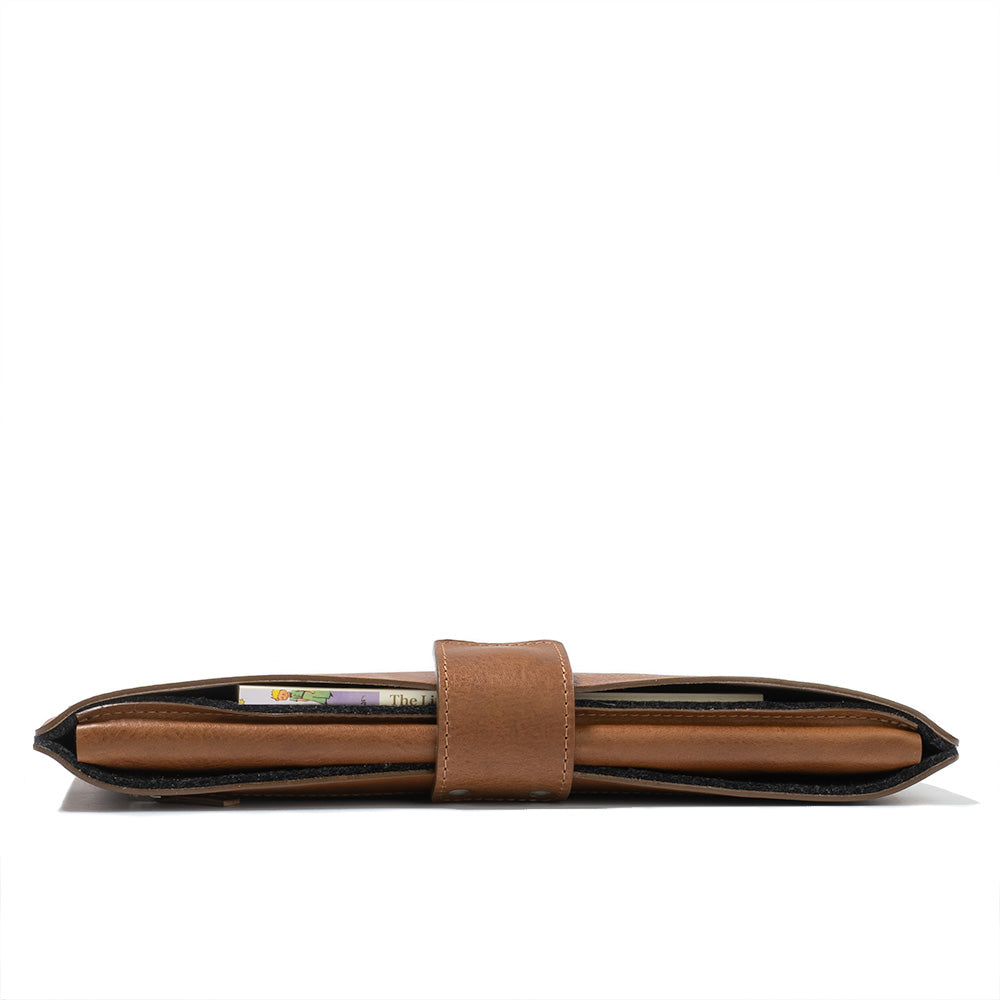 Leather Sleeve Bag for MacBook Pro 13 with zipper pocket in brown color made by Geometric Goods