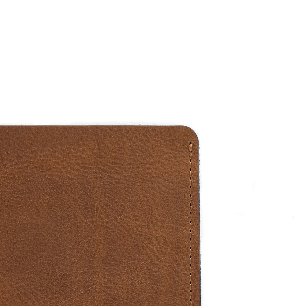 Leather Sleeve Bag for MacBook Pro with zipper pocket in brown color made by Geometric Goods