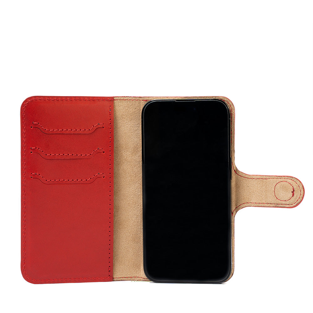iPhone 14 series folio case with MagSafe made from top-grain vegetable tanned leather in red color by Geometric Goods leather workshop