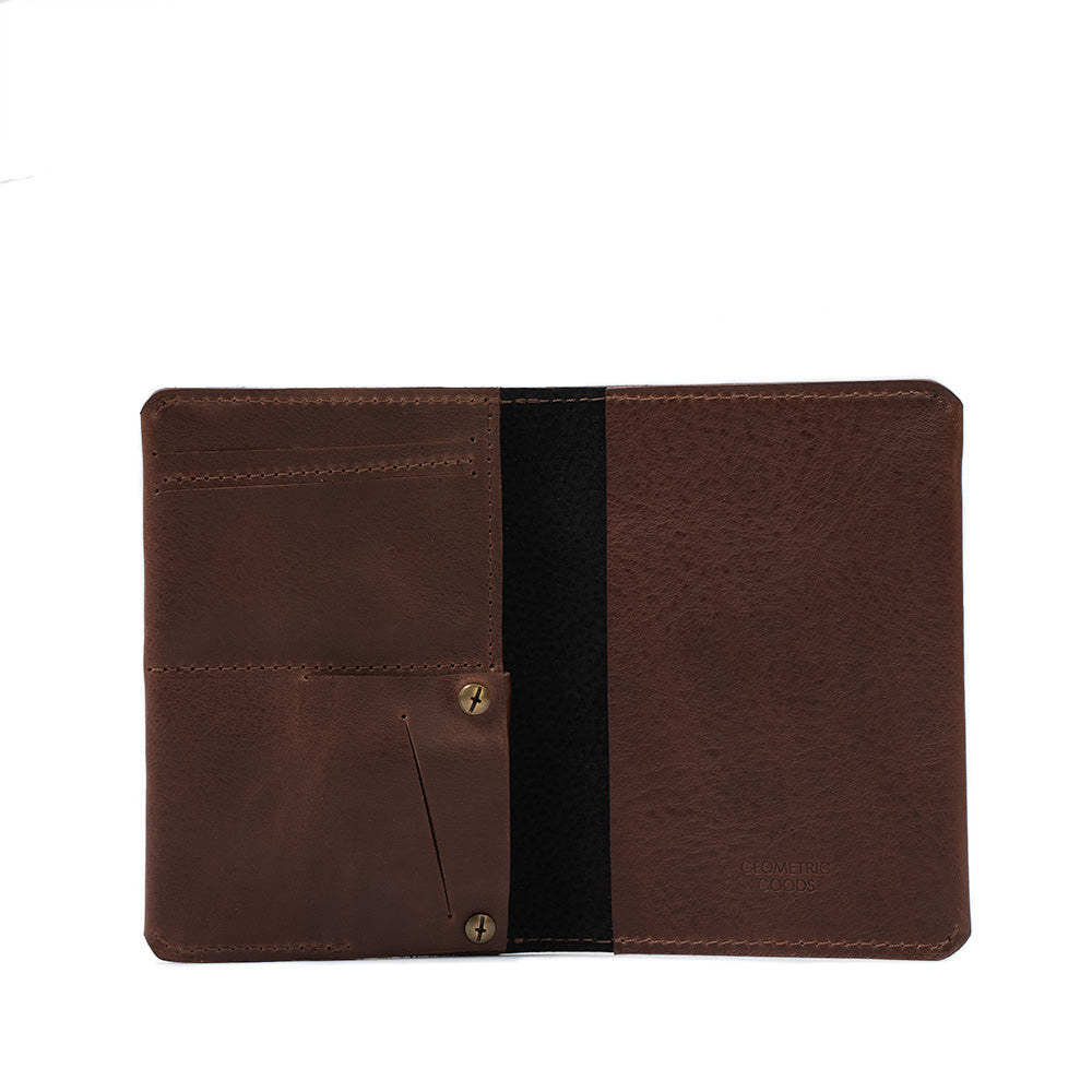 Geometric Goods' smart and trackable AirTag passport holder, crafted from premium mahogany dark brown Italian leather.
