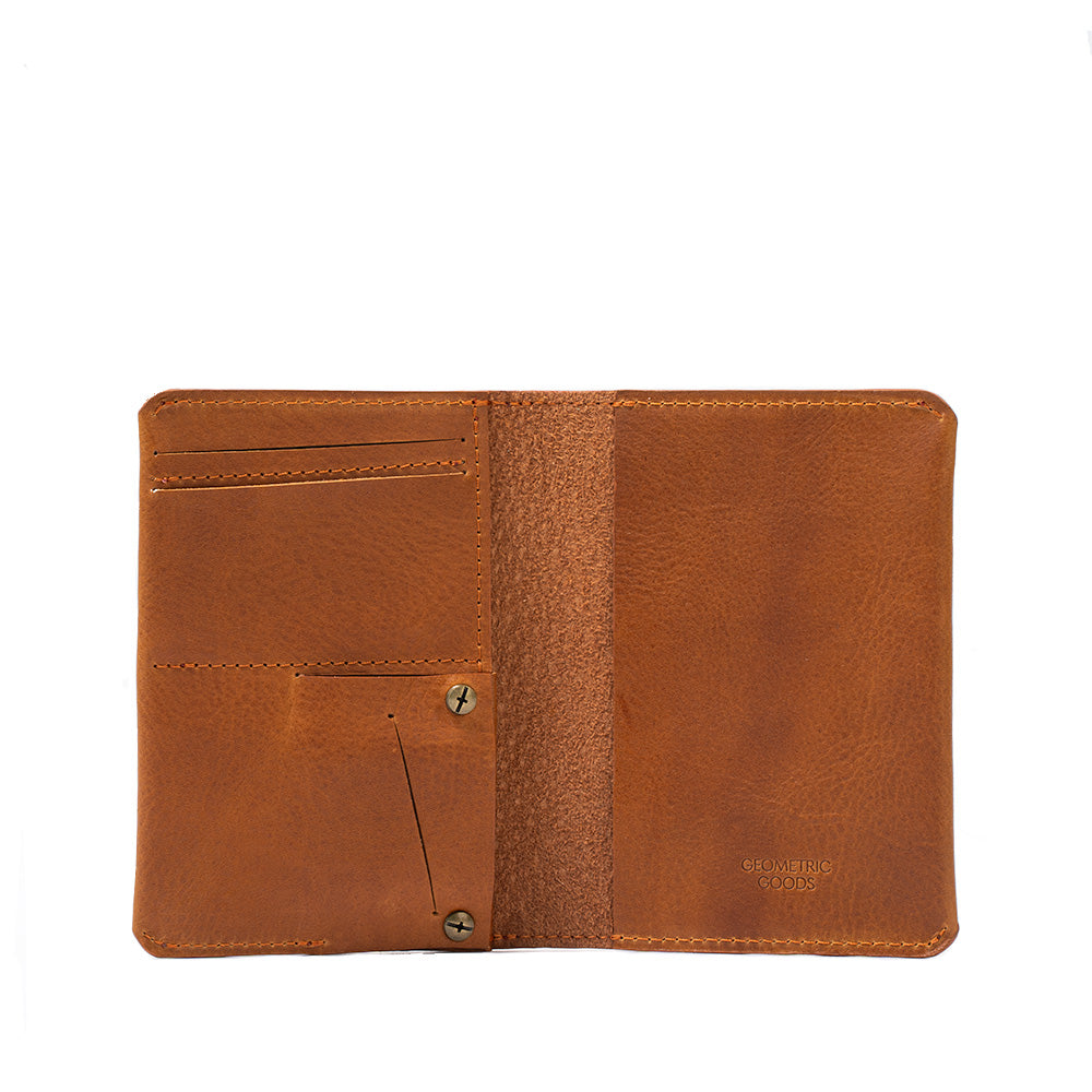 Geometric Goods' smart and trackable AirTag passport case, crafted from premium tan cognac brown Italian leather.