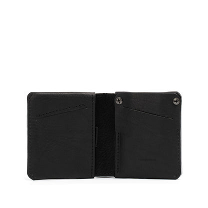 The best men's AirTag billfold wallet with hidden slot, crafted by Geometric Goods from premium full-grain Italian leather in black color.