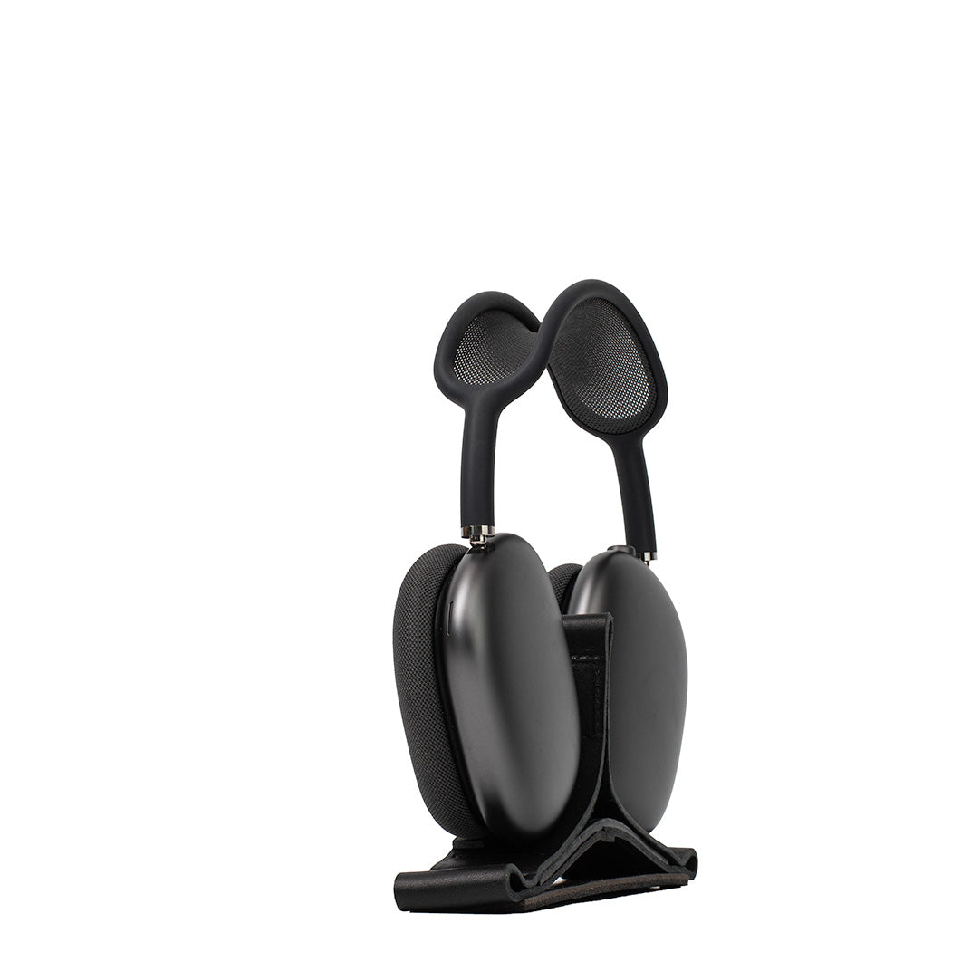 minimalist stand for AirPods Max in black color with low-power mode activation