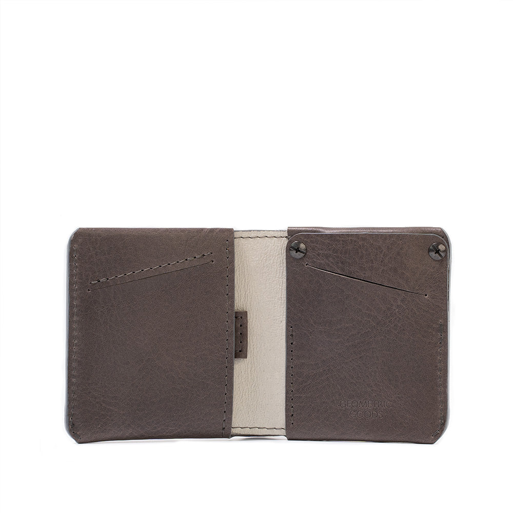 The best Geometric Goods bifold AirTag wallet, with hidden slot, crafted from premium full-grain Italian leather in gray color