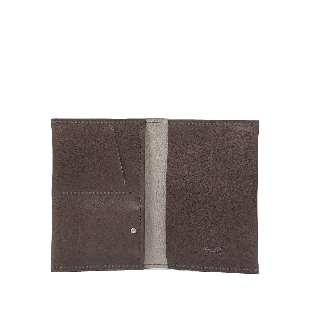 AirTag passport holder 2.0 in gray leather showcasing its durability and style