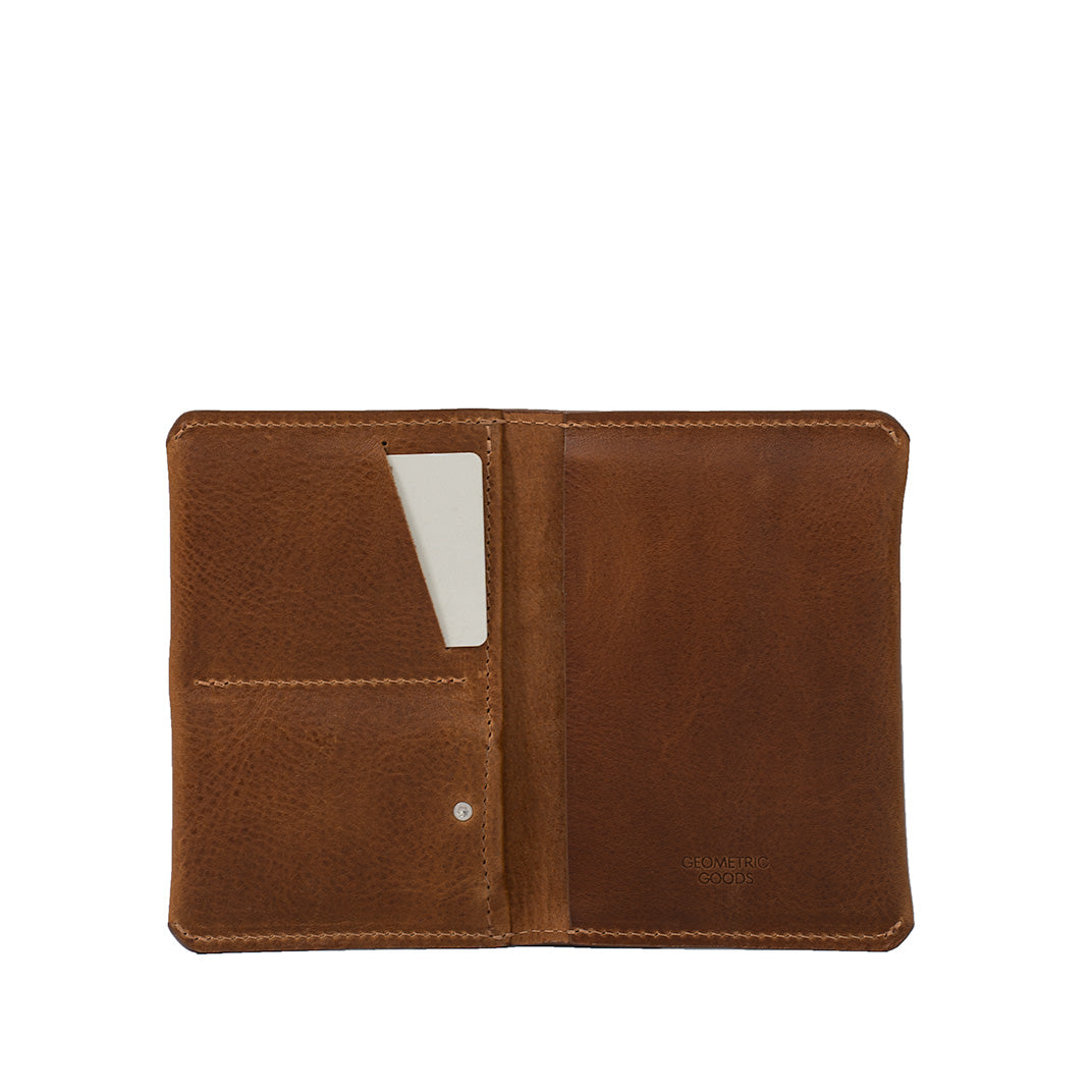 leather passport holder made for AirTag in brown color
