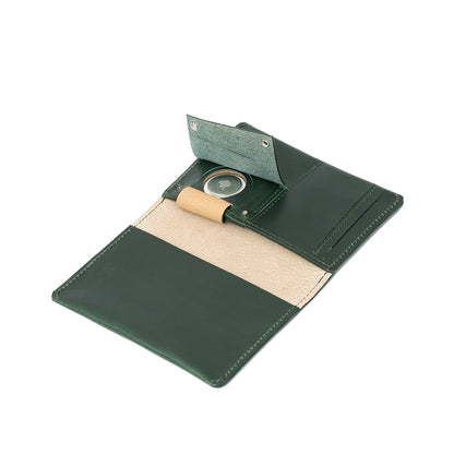 AirTag passport cover made from premium Italian top-grain leather in green color