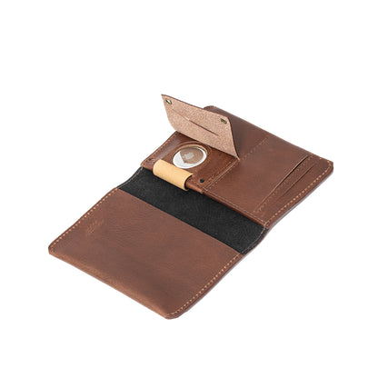AirTag passport holder made from premium full-grain Italian leather in mahogany brown color