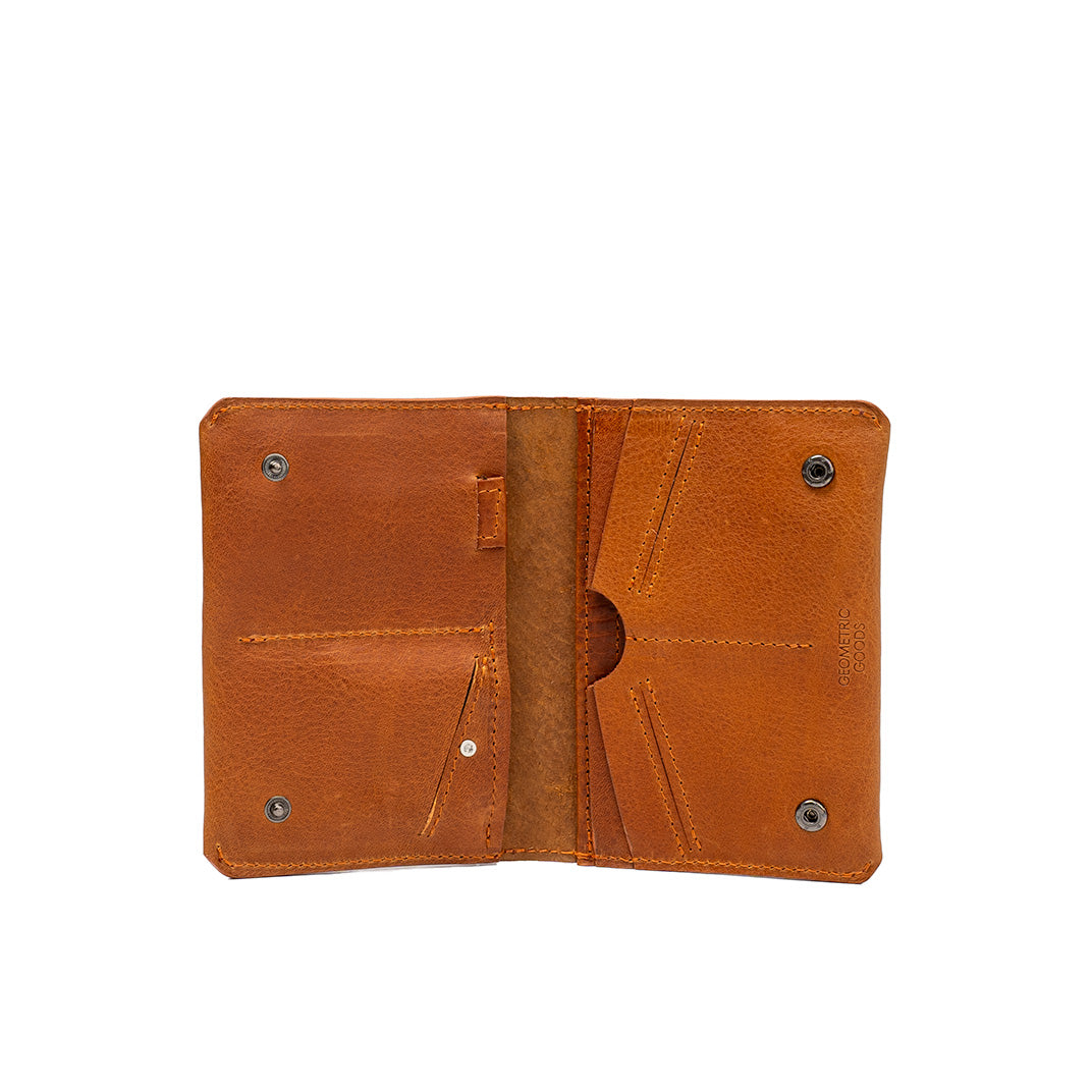 airtag travel wallet made of leather in tan (cognac brown) color