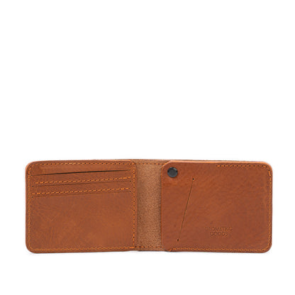 A premium tan cognac brown color leather billfold wallet that seamlessly integrates with Apple's AirTag tracking technology made by Geometric Goods