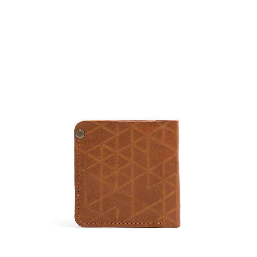 airtag wallet made by Geometric Goods from premium Italian leather in cognac brown (tan) color and vectors design