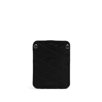 AirTag wallet card holder with hidden slot for Apple's AirTag made by Geometric Goods form premim Italian full-grain vegetable tanned leather in black d vectors desing