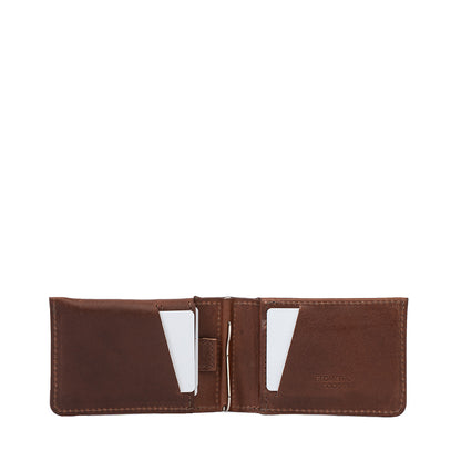 Slim brown full-grain leather AirTag wallet with hidden tracker slot and money clip – Geometric Goods