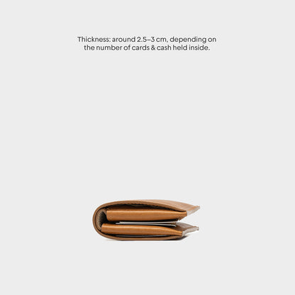 Side view of a compact leather AirTag wallet with RFID protection and a hidden slot for AirTag, folded in a minimalistic design.