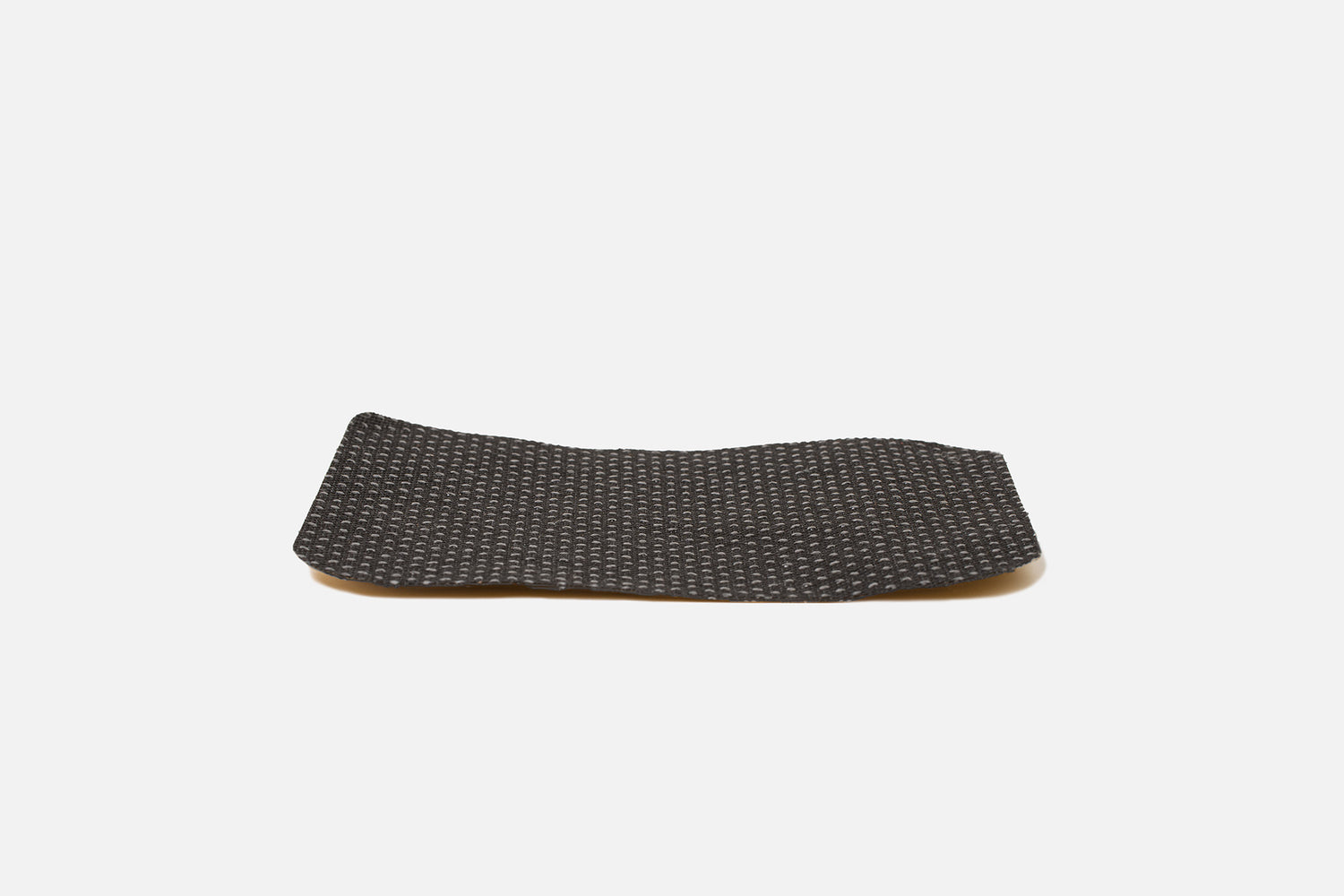 Textured anti-slip bottom layer —improves grip on smooth desks and prevents sliding