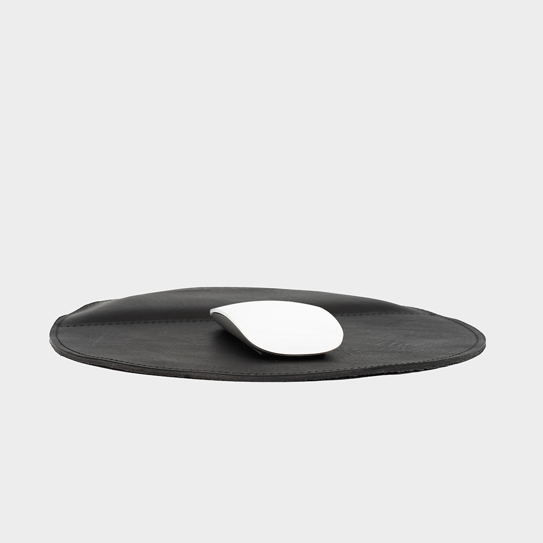 Premium mouse pad with smooth surface, ideal for all Apple mice and productivity setups