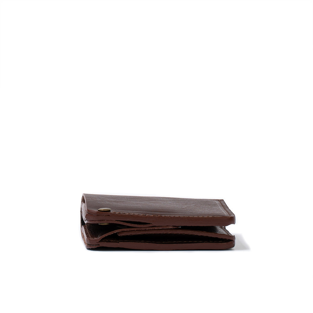 AirTag wallet with large coin punch made by Geometric Goods from premium Italian Leather in dark brown color folded photo