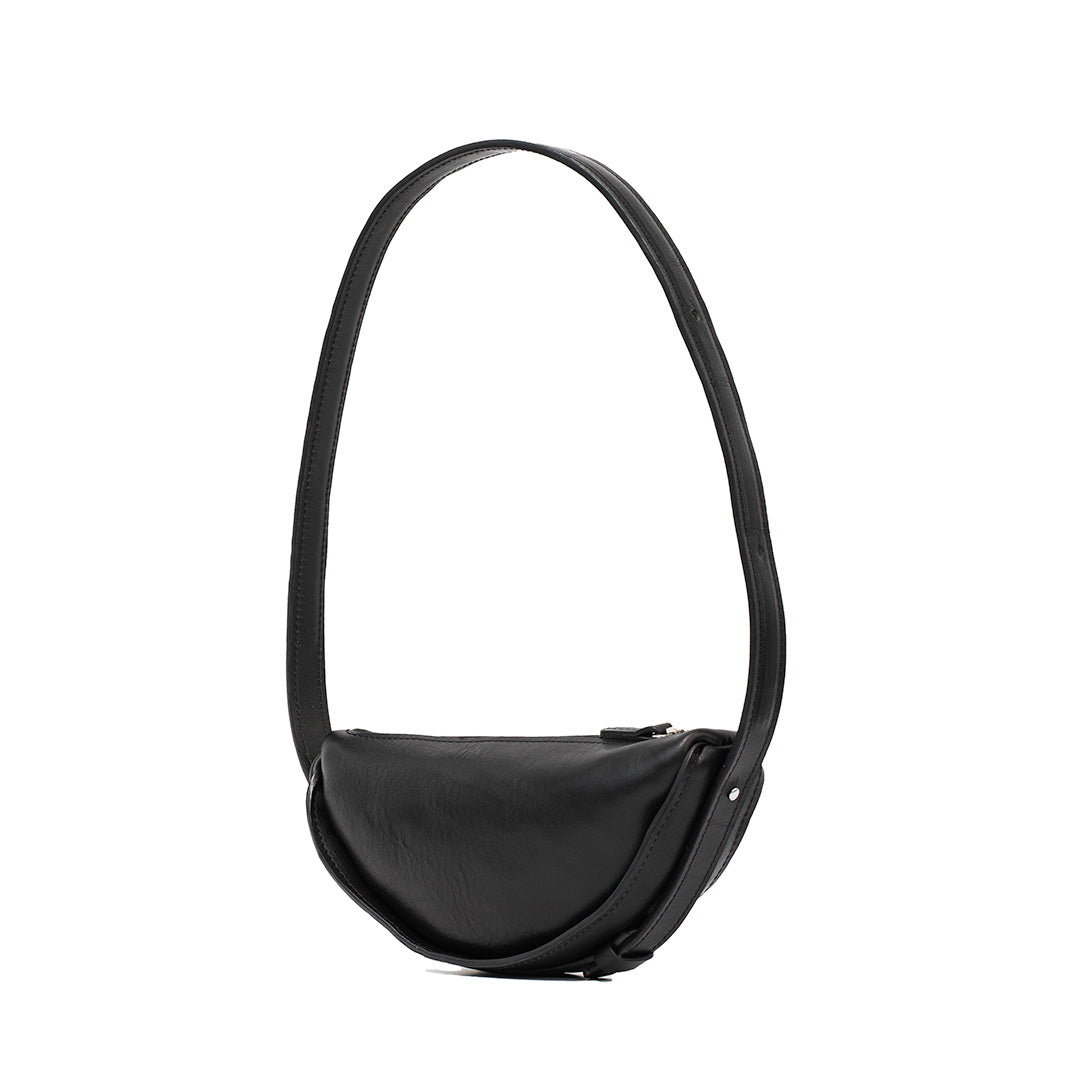 Black leather crescent-shaped shoulder bag with a long strap, perfect for daily use and evening wear